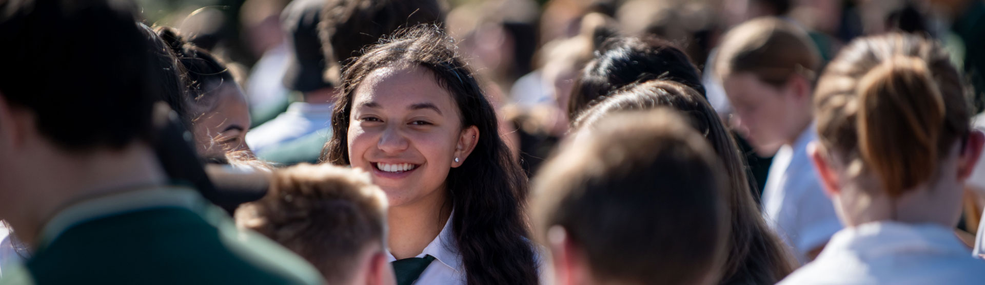 Female student in school crowd