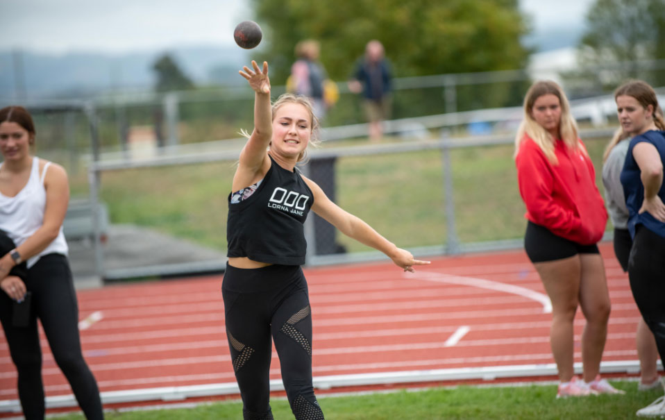 Girl is playing Shot put