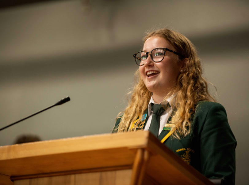 Head student addressing school assembly