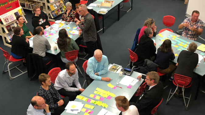 WC - Intro Module-Our Board Student working collaboratively in classroom