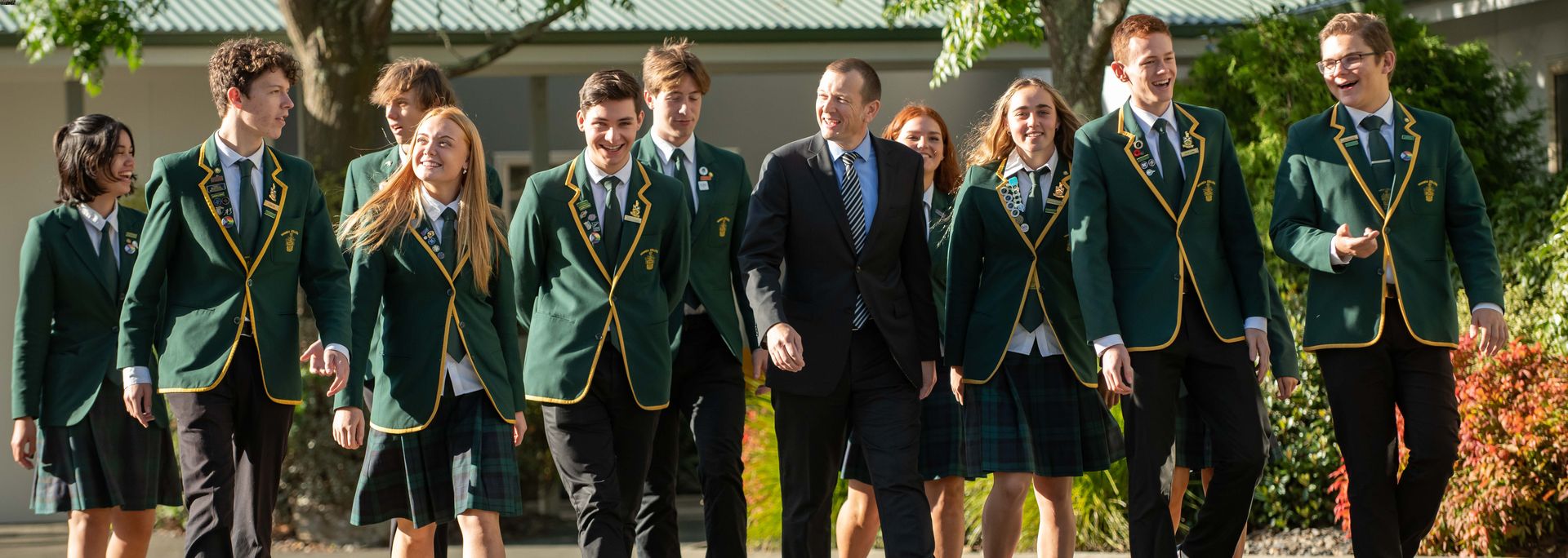 Principal addressing school assembly