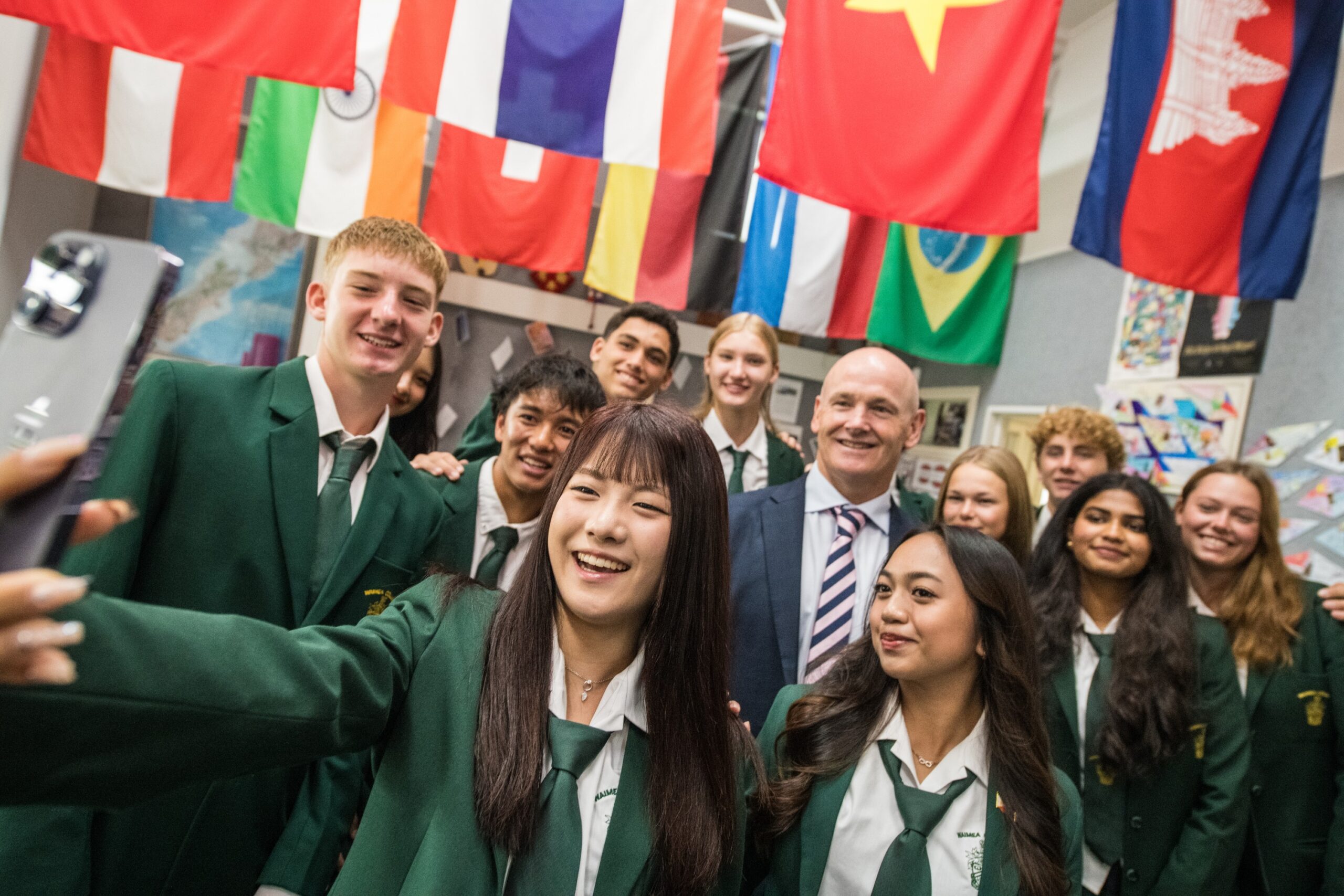 Students working collaboratively on their devices